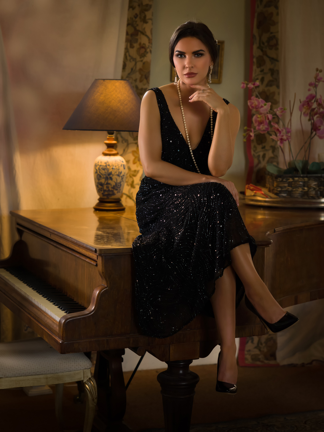 Lady in flapper dress on piano